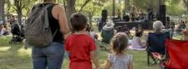 Family watching an Austin outdoor concert
