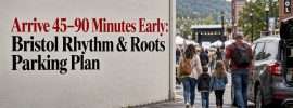 Early arrivals walking from downtown festival parking