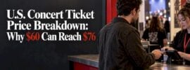 Concert fan paying at venue ticket counter