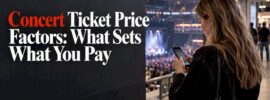 Fan comparing concert seats on phone